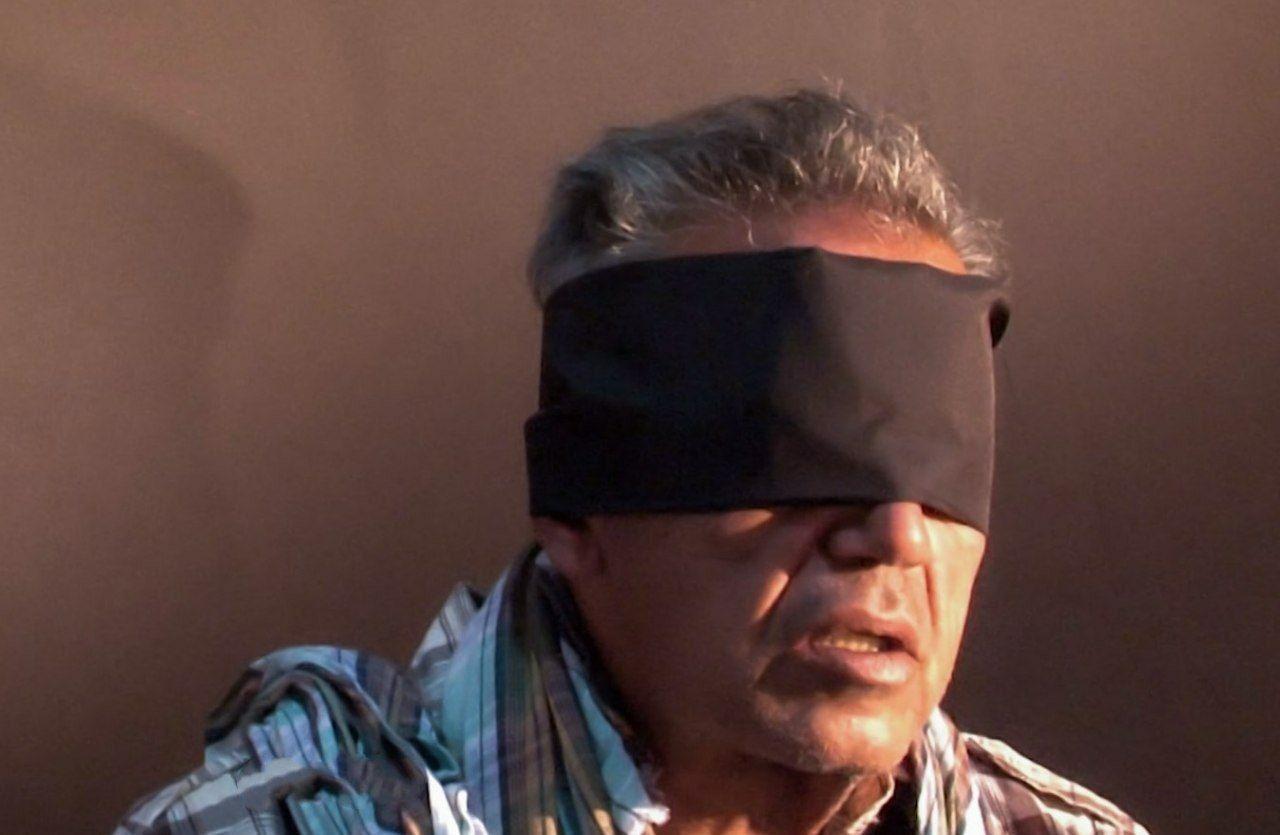 تصویر جمشید شارمهد پس از دستگیری