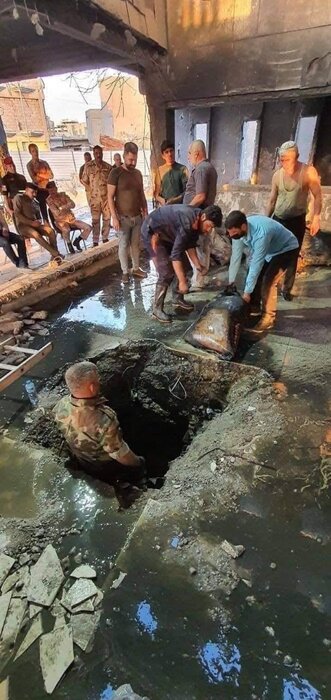 کشف ۲۰۰ کیسه اسکناس از زیر آوار بانکمرکزی عراق + فیلم کشف ۲۰۰ کیسه اسکناس از زیر آوار بانکمرکزی عراق + فیلم