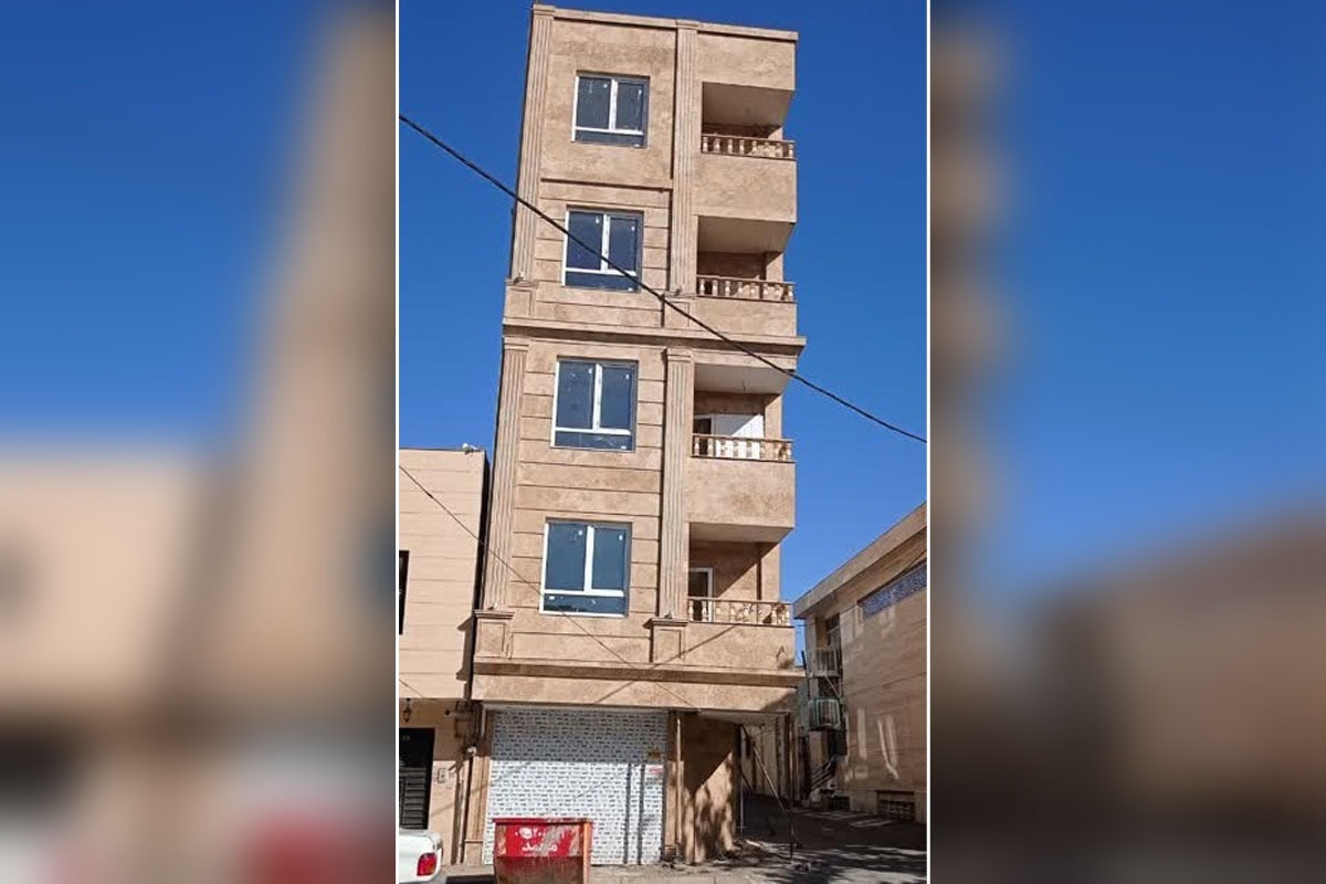 ساکنان محله حرعاملی مشهد خواستار قلع ساختمان کج شدند+تصویر