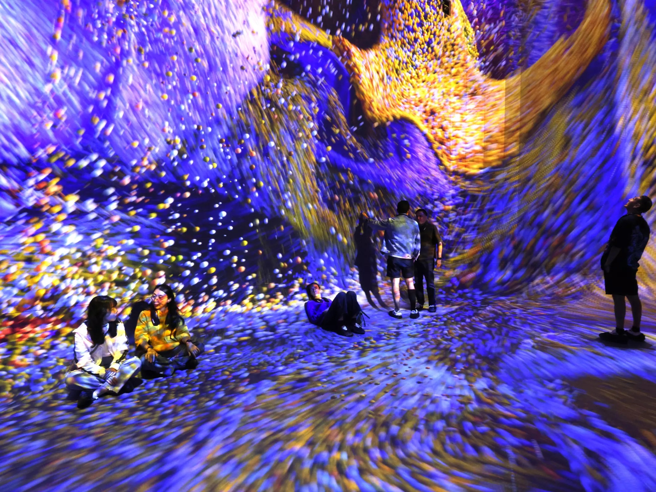 Visitors are immersed in imagery at Dataland. (Genaro Molina / Los Angeles Times)