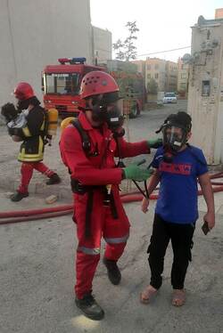 مهار آتش‌سوزی مهیب یک مجتمع مسکونی در الهیه مشهد و نجات ۸ نفر از میان دود و آتش + تصاویر