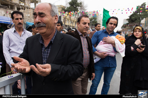 گزارش تصویری زایران و مجاوران حرم رضوی در آستانه سال نو عکاس داود بهگام شهرآرا