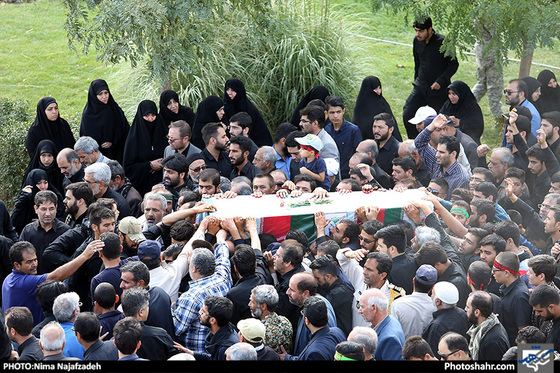 گزارش تصویری | تشییع و تدفین پیکر شهید مدافع حرم محمد اسدی در پارک خورشید مشهد | عکس : نیما نجف زاده /شهرآرا