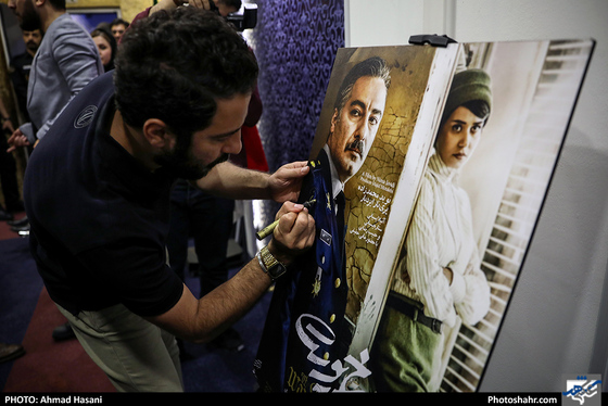 اکران مردمی فیلم «سرخ پوست» در مشهد با حضور نوید محمدزاده / عکس: احمد حسنی / شهرآرا