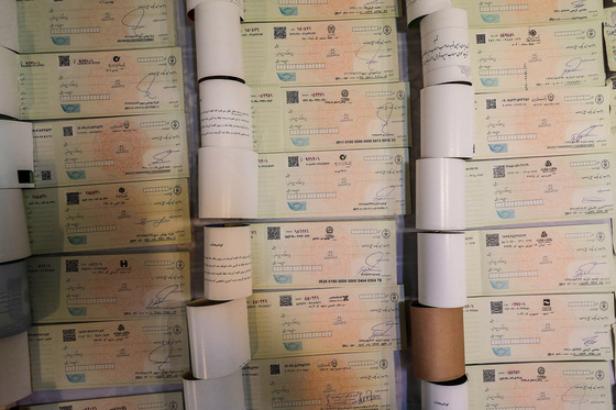 انهدام بزرگترین باند کلاهبرداری کشور با بیش از 30 هزار فقره چک برگشتی‎