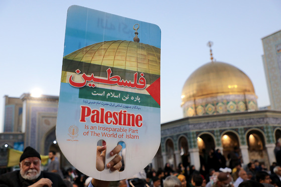 اجتماع همبستگی با جبهه مقاومت فلسطین در صحن قدس حرم مطهر رضوی