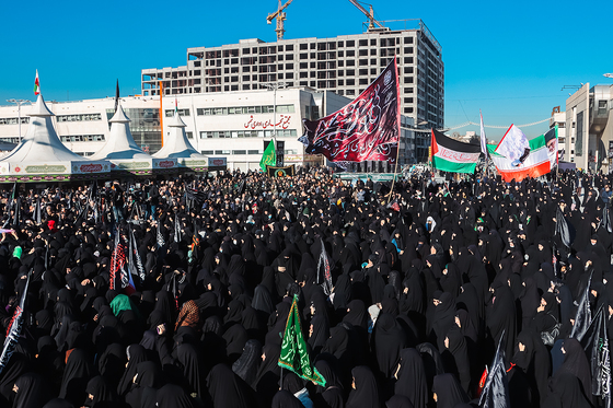 تشییع پیکر 12 شهید گمنام دفاع مقدس و 2 شهید حادثه تروریستی راسک در مشهد