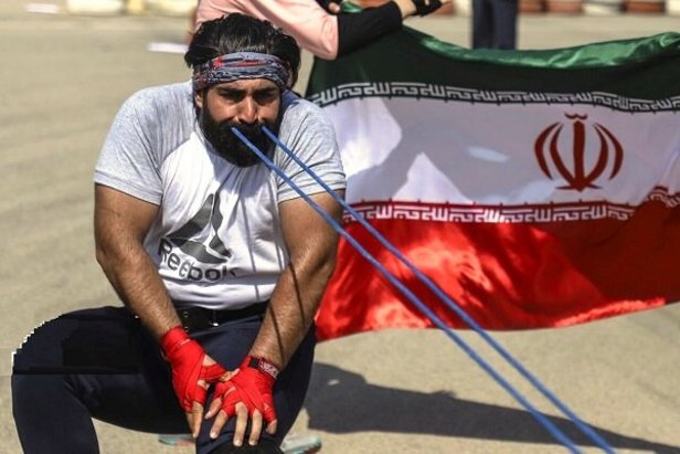 ثبت رکورد جهانی کشیدن کامیون با دندان توسط برادر و خواهر خوزستانی + تصاویر