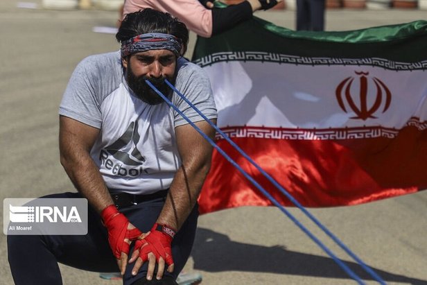 ثبت رکورد جهانی کشیدن کامیون با دندان توسط برادر و خواهر خوزستانی + تصاویر