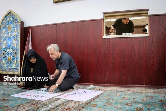 گزارش تصویری | پویش مردمی پلاکاردنویسی «باید برخاست»