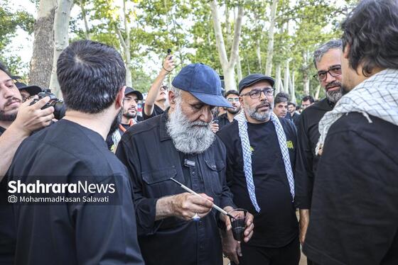 گزارش تصویری | اجرای دیوار نگاره «قوموا لله» با حضور هنرمندان بین المللی در مشهد
