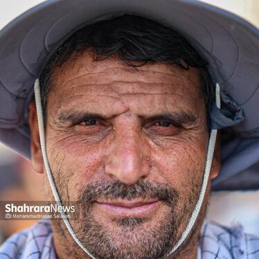 گزارش تصویری | خادمان فیروزه ای در خیابان های نجف